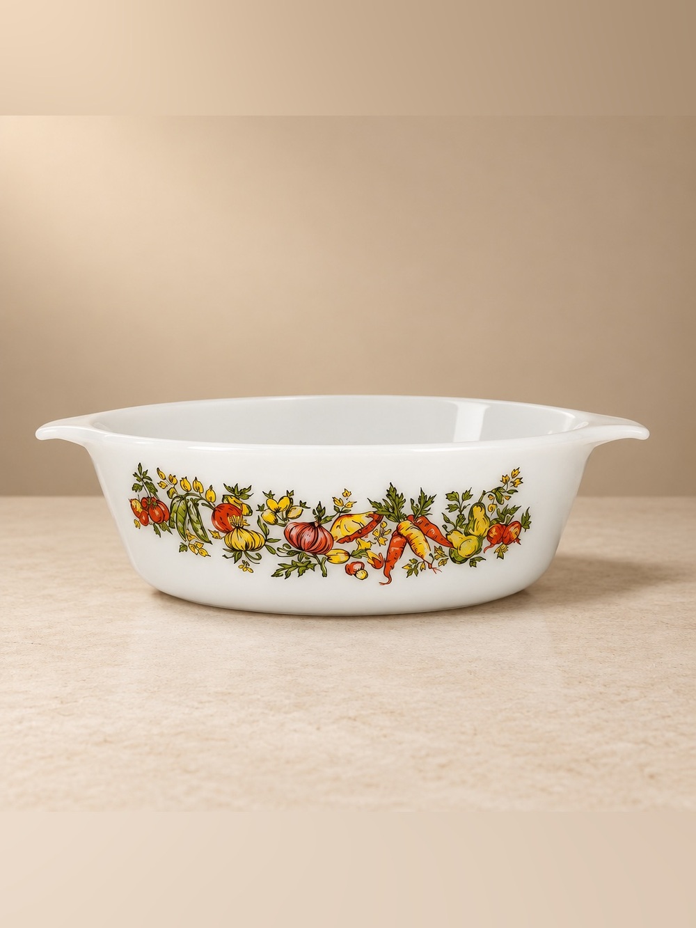 Anchor Hocking Fire-King milk glass casserole dish in the Fall Harvest Pattern